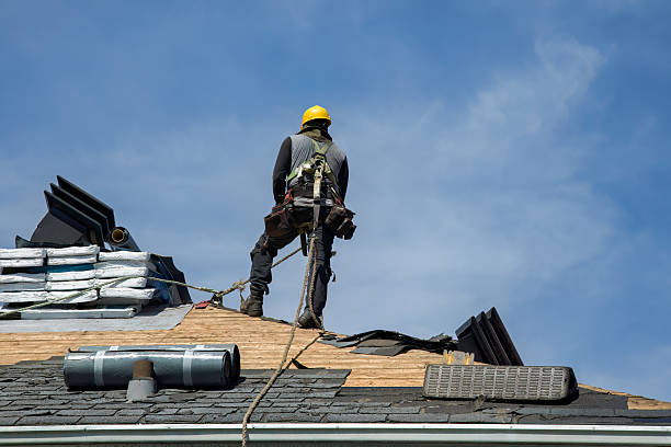 Professional Roofing technician working in Mc Donald, OH
